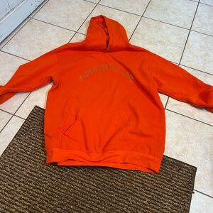 orange boys lie sweatshirt